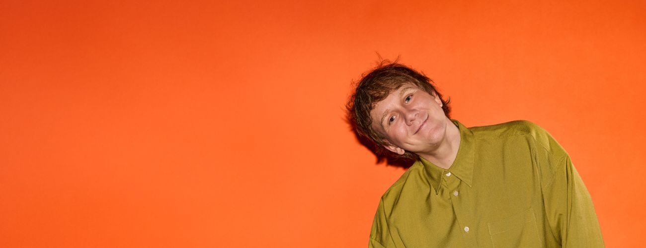 Josh Thomas Jiggle Jiggle Orange background